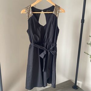 Black dress with gold detail, size Medium
